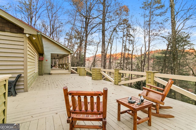 wooden terrace featuring a mountain view