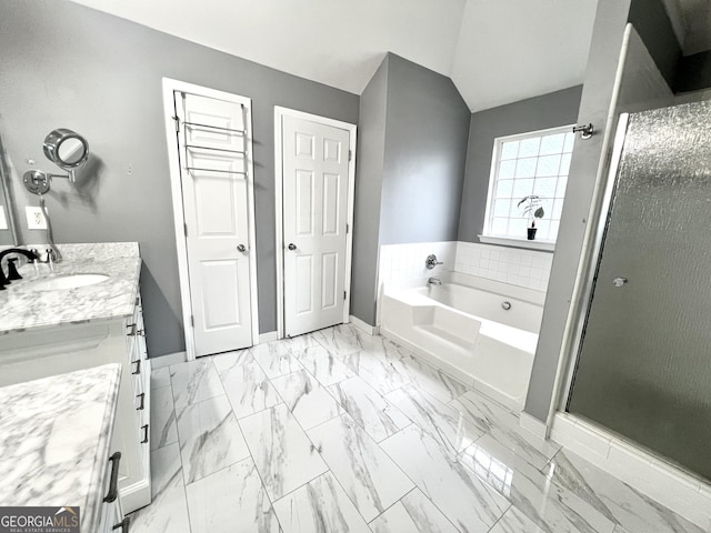 bathroom with shower with separate bathtub and vanity