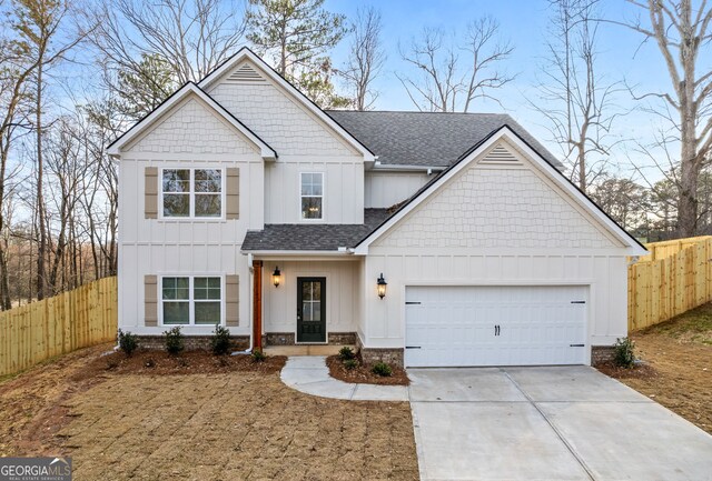 view of front of property featuring a garage