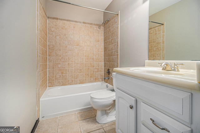 full bathroom featuring toilet, vanity, and tiled shower / bath