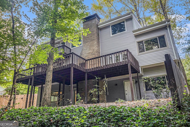 rear view of house with a deck