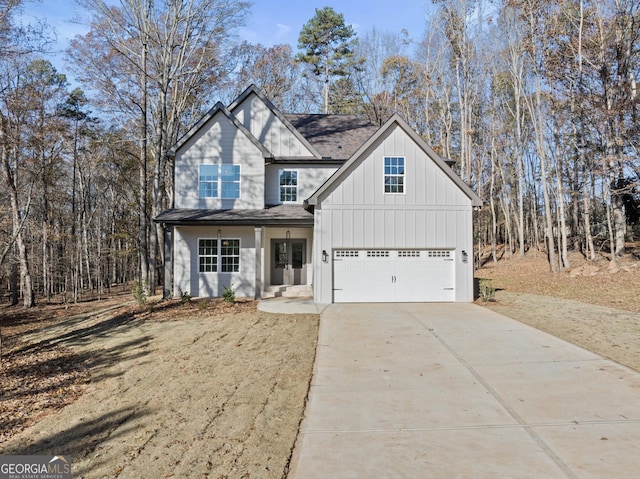 view of front of property with a garage