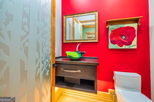 242 Kirkley Rd, Tyrone, GA 30290 - bathroom featuring hardwood / wood-style floors and toilet