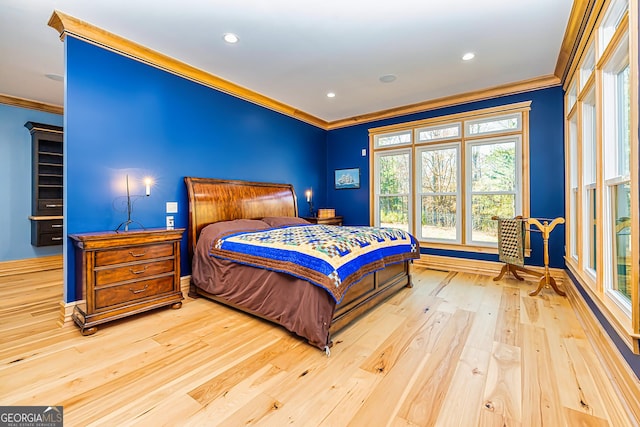 242 Kirkley Rd, Tyrone, GA 30290 - bedroom featuring crown molding and light wood-type flooring