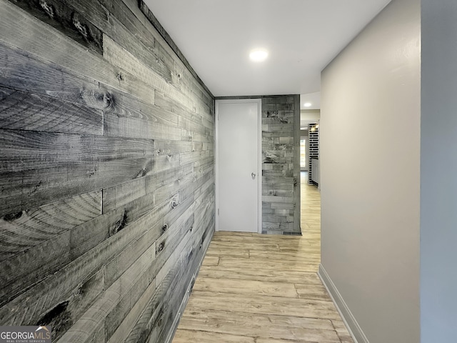 corridor featuring light hardwood / wood-style floors