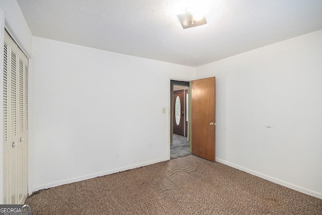 1228 Old Rockmart Rd SE, Silver Creek, GA 30173 - unfurnished bedroom featuring carpet, a closet, and baseboards