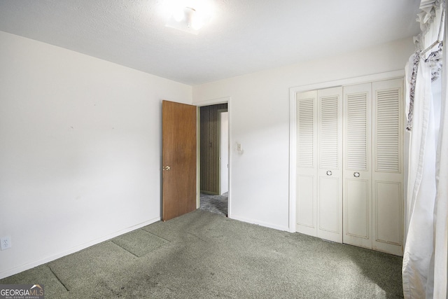 1228 Old Rockmart Rd SE, Silver Creek, GA 30173 - unfurnished bedroom featuring carpet and a closet