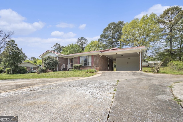 1228 Old Rockmart Rd SE, Silver Creek, GA 30173 - single story home with driveway, an attached carport, and brick siding