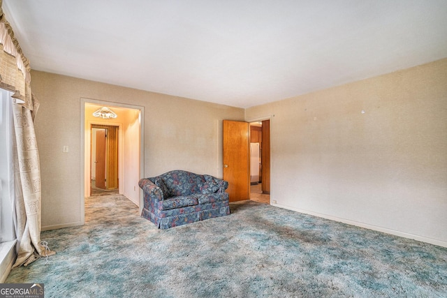 sitting room featuring carpet floors