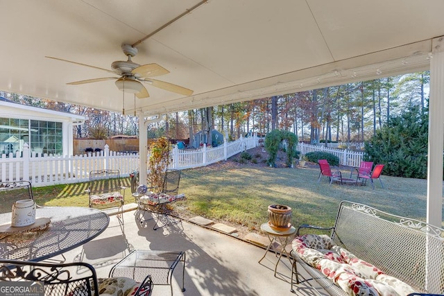 view of patio featuring ceiling fan