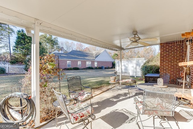 view of patio / terrace featuring ceiling fan