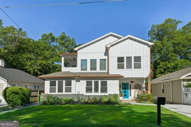 view of front of home with a front lawn