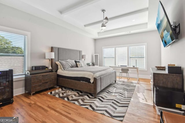 bedroom featuring hardwood / wood-style floors and ceiling fan