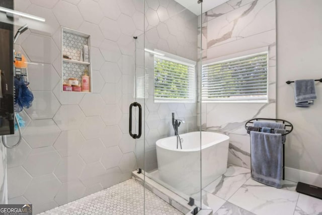 bathroom featuring plus walk in shower and tile walls