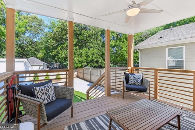 wooden deck with ceiling fan