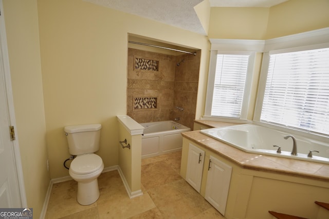 full bath featuring baseboards, a combined bath / shower with jetted tub, toilet, and tile patterned flooring