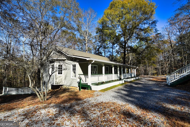 view of home's exterior with covered porch