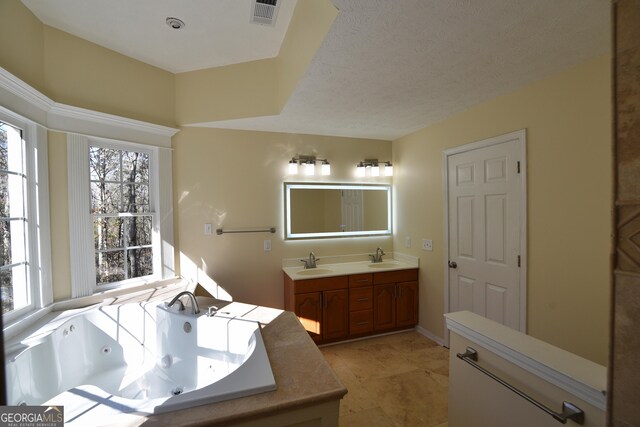 unfurnished bedroom featuring wood-type flooring, a textured ceiling, ceiling fan, and a closet