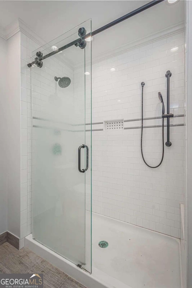 bathroom featuring an enclosed shower