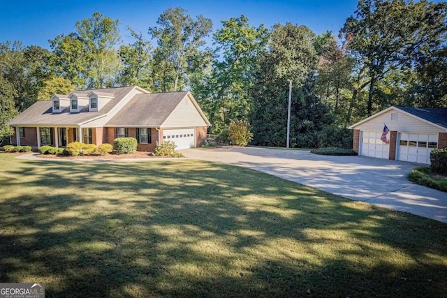 view of front of home with a garage and a front yard