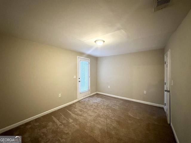 view of carpeted spare room