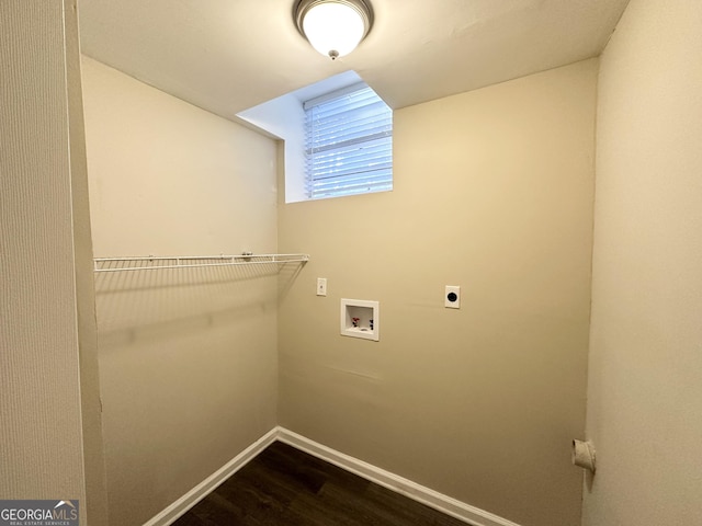 laundry area with hookup for an electric dryer, hookup for a washing machine, and hardwood / wood-style flooring