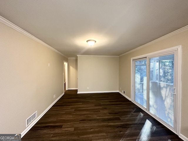 unfurnished room featuring crown molding and dark wood-type flooring