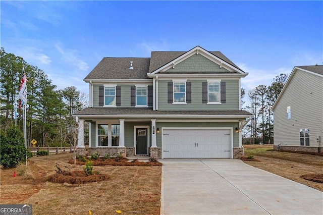 craftsman house with a garage