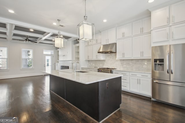 kitchen with coffered ceiling, white cabinets, sink, decorative light fixtures, and stainless steel fridge with ice dispenser