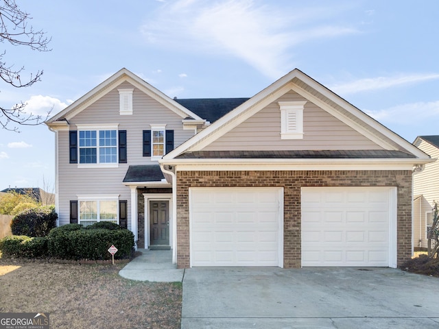 view of front of property with a garage