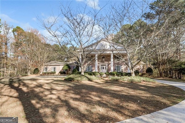 view of neoclassical / greek revival house