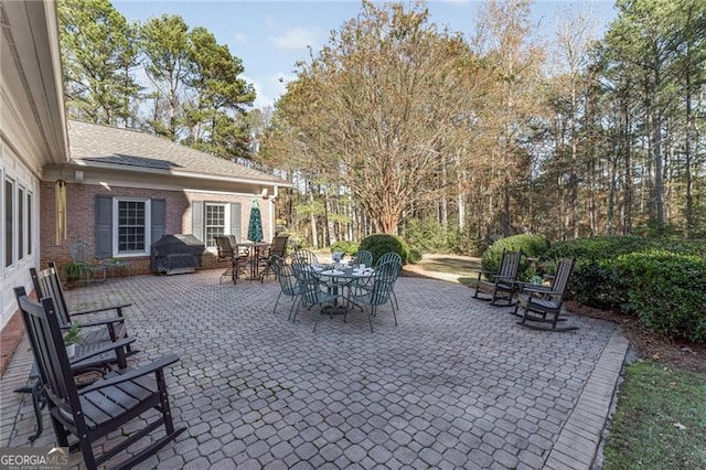 view of patio with a grill