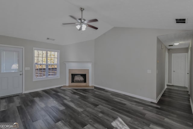 unfurnished living room featuring ceiling fan, dark hardwood / wood-style flooring, and lofted ceiling