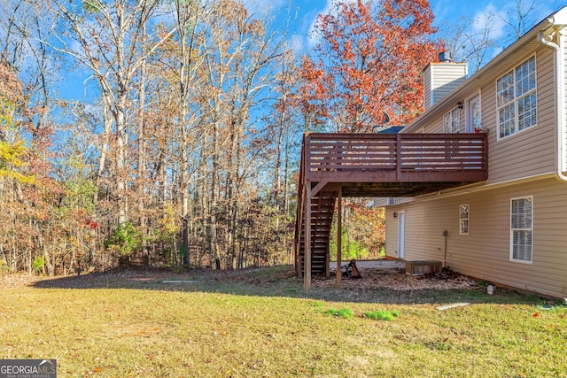 view of yard featuring a wooden deck