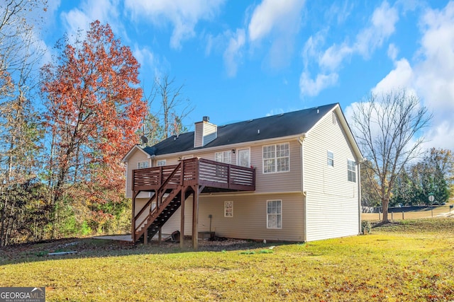 rear view of property with central AC, a lawn, and a wooden deck