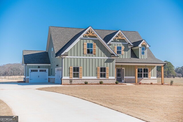 craftsman-style house featuring a porch and a front yard