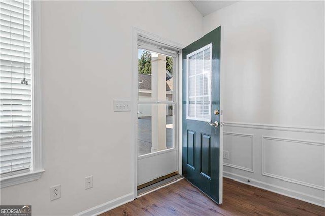 entryway with hardwood / wood-style flooring