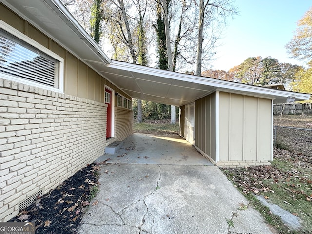 view of car parking featuring a carport