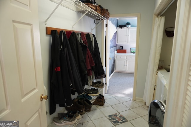 walk in closet featuring light tile patterned floors