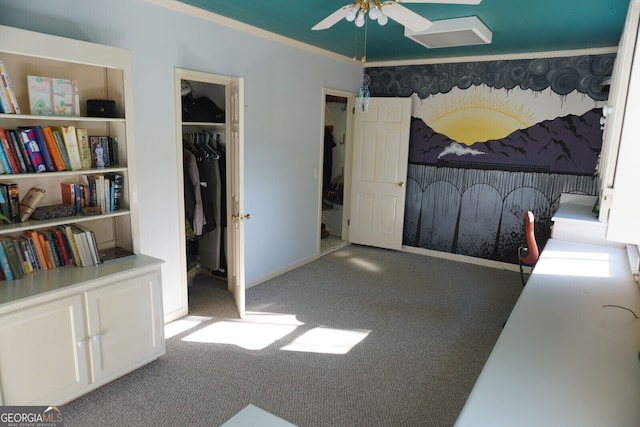 interior space with crown molding and a closet