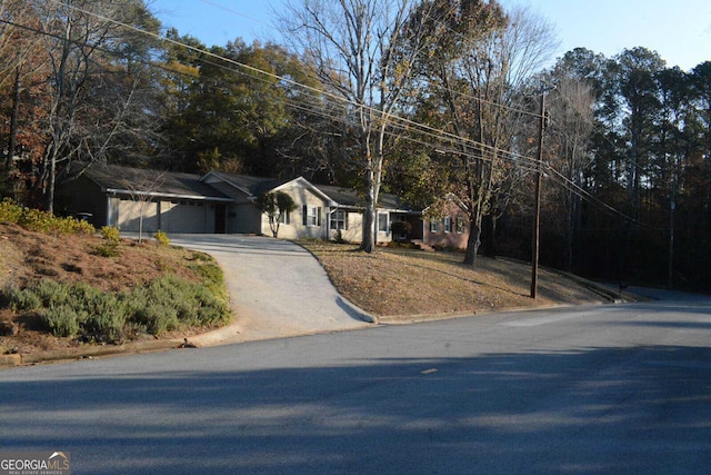 view of front of home with a garage