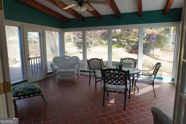 sunroom / solarium with vaulted ceiling with beams and ceiling fan