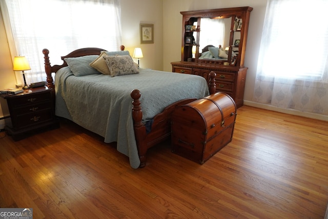 bedroom featuring hardwood / wood-style floors