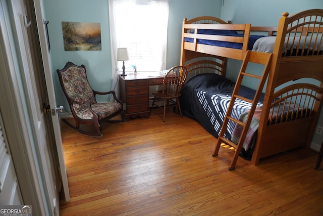 bedroom with light wood-type flooring