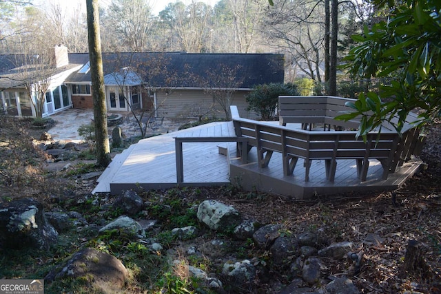 exterior space featuring a wooden deck