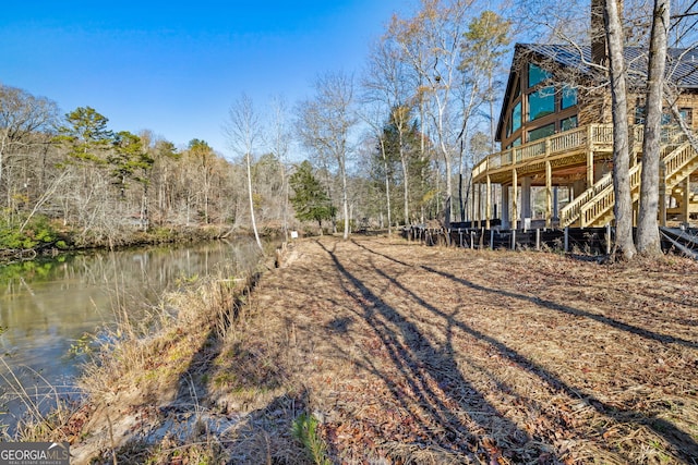 view of yard with a water view