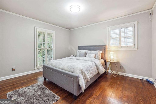 bedroom featuring ornamental molding and dark wood-type flooring