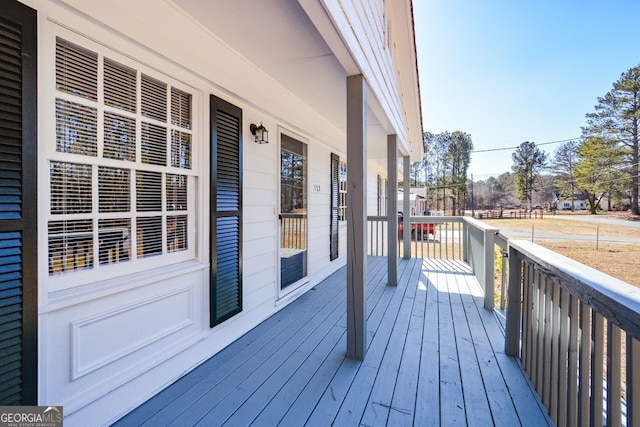 deck featuring covered porch