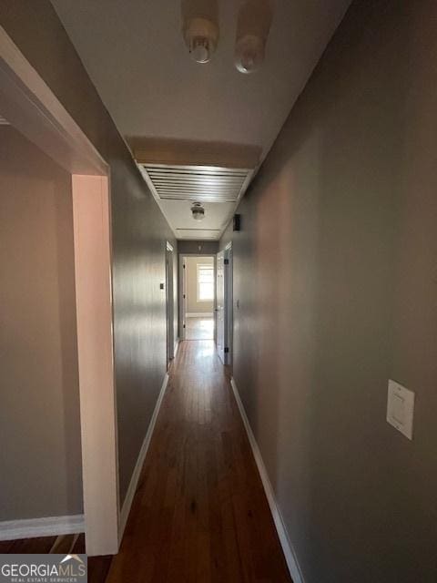 hallway featuring hardwood / wood-style floors