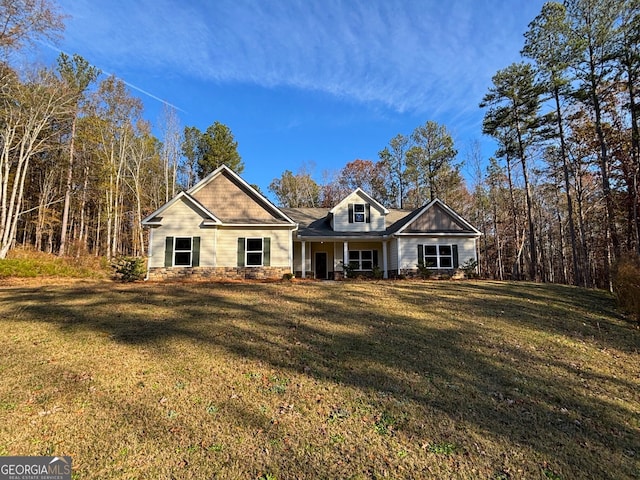 view of front of home featuring a front yard